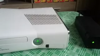 Xbox 360 Slim Doesn't turn on. Blinks 11-12 red dots and loud fan noise then turn off. Help me all.