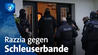 Razzia gegen mutmaßliche Schleuserbande in Deutschland