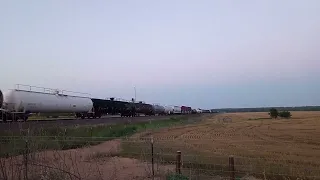 BNSF Wb H-TPLSLA up the long steep grade. Brownwood,Tx.  05/19/2024