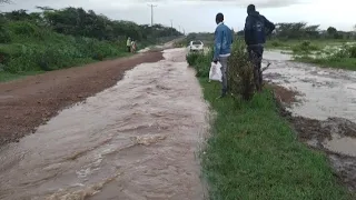 Prison visit, and encountering flood waters to and from town in rural Kenya, East Africa.