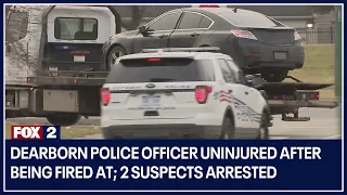 Dearborn police officer uninjured after being fired at; 2 suspects arrested