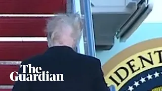 Donald Trump's hair blown apart by the wind