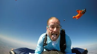 Mad Hatter piggy-backs Wingsuiter for 1,000th Skydive (120mph)