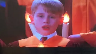 A scene from Home Alone 2. The Christmas choir. Kevin ruins the party.