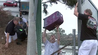 VIDEO: Stranded travelers ditch cars on 105 Freeway, climb fence to reach LAX | ABC7