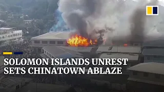 Solomon Islands riot sets Chinatown ablaze in capital Honiara as protests turn violent