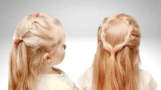 Hairstyle with colored elastic bands on loose hair