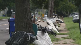 University City still working to pick up trash one month after flooding