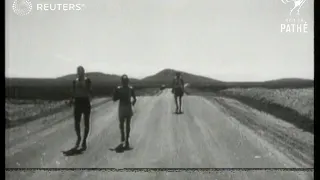 USA: ATHLETICS - Coast-to-Coast Marathon walkers crossing the Mojave desert (1928)