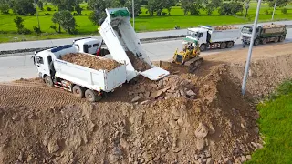 Powerful Komatsu D58E1 Bulldozer Push Soil , Clearing Land Fill up and  Dump Truck Unloading Soil