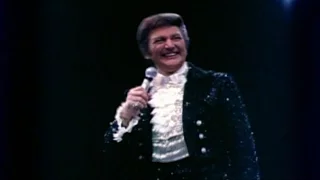 Liberace Talking To His Audience