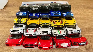 Box full of various miniature cars Jaguar, Peugeot, Renault, Hyundai, Mazda, Volvo, Honda, Opel #717