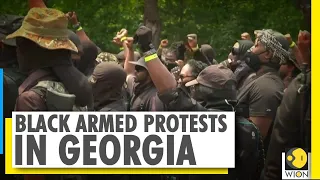 Black Armed protesters march through Confederate memorial park in Georgia