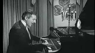 Liberace playing I'm Looking Over a Four Leaf Clover