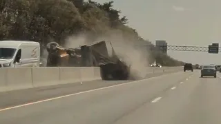 Dashcam captures dump truck rollover on Mass. highway