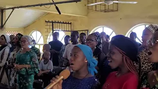 Sir Tony Ajuruchi with St Michael's Parish Choir Amakohia singing"Holy Holy" by Jude Nnam