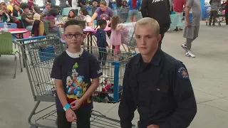 'They are just like they are': Officers, students get together for 'Shop with a Cop' in Aurora