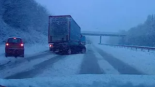 Car Crashes Into Lorry On Snowy Motorway