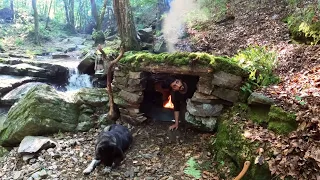 BUSHCRAFT CAMP; Building a  ROCK Survival SHELTER. Wilderness Camping with Dog