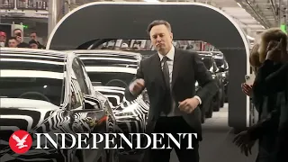 Elon Musk dances at the opening of new European gigafactory