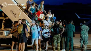 Planes carrying evacuees from Niger land in Europe