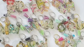 DIY: how I upgraded my key chains to high sparkle designs using 3 Dimensional glue stickers symbols.