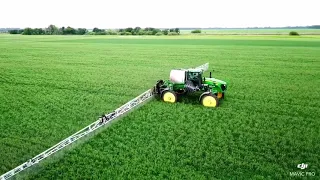 John Deere 4830 sprayer with 120 feet / 36.5m boom spraying wheat.