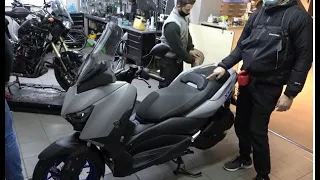 Where is the battery - YAMAHA XMAX