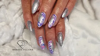 Quick Salon Nail extension. Sculpted almond shape nails on forms with fiber gel and quick nail art