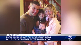 Backed by blue: OPD officers stand in for fallen officer at daughter's graduation