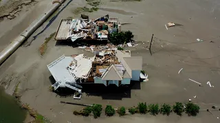 Grand Isle, La worst damage from Hurricane Ida- levee breaks- drone 4k