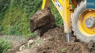 Landslide Blocked Hilly Road-JCB Backhoe Loader-Clearing Stone and Dirt