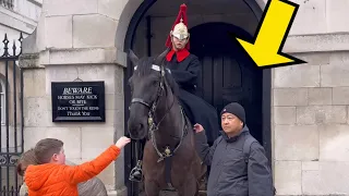 SILLY IDIOTS REFUSE TO RELEASE  hold on the king’s guard horse reins!!!