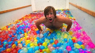 Moving truck FILLED with 10,000 WATER BALLOONS!