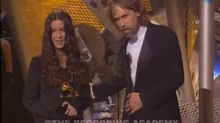 Alanis Morissette accepting the GRAMMY for Album Of The Year at the 1996 GRAMMY Awards | GRAMMYs