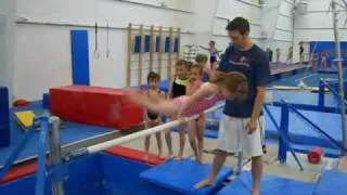 7 year old giant on bars with no spot or straps