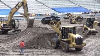 Carrier Dome is filled with tons of dirt in preparation for Monster Jam