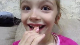 как вырвать молочный зуб дома без боли, how to pull out a milk tooth at home without pain