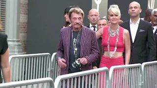 Johnny Hallyday and his wife Laeticia, Jane Birkin and more attending the YSL Men Fashion Show