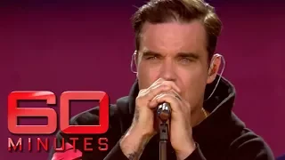 Robbie Williams emotional response to Manchester tribute | 60 Minutes Australia