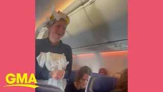 Bride-to-be walks down the aisle mid-flight in toilet paper dress