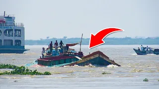 The overloaded cargo barge is stuck in the mouth of 3 rivers trying to cross dangerous fast water