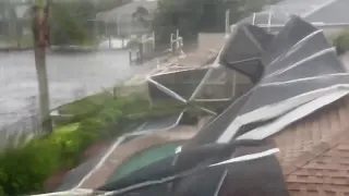 Pool roofing torn away by Hurricane Ian