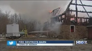 Fire destroys barn