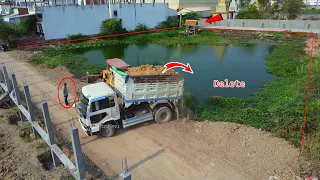 Start one more perfect project! Fill soils into water, Bulldozer KOMATSU D-30, Dump Truck Unloading