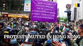 Massive police presence blunts Hong Kong protests on China’s National Day