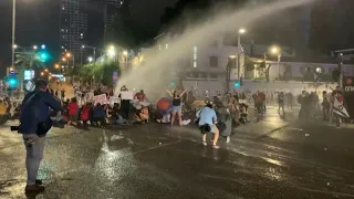 Israeli police scuffle with anti-government protesters in Tel Aviv | AFP