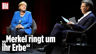 Merkel bricht ihr Schweigen: So war ihr erster Auftritt als Alt-Kanzlerin