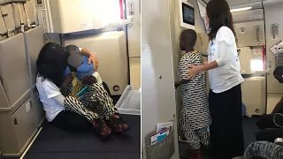 Woman Consoles Crying Child Having A Meltdown During Flight