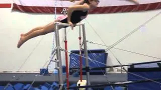 Slow motion glide kip on bars